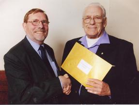 Len being presented an award